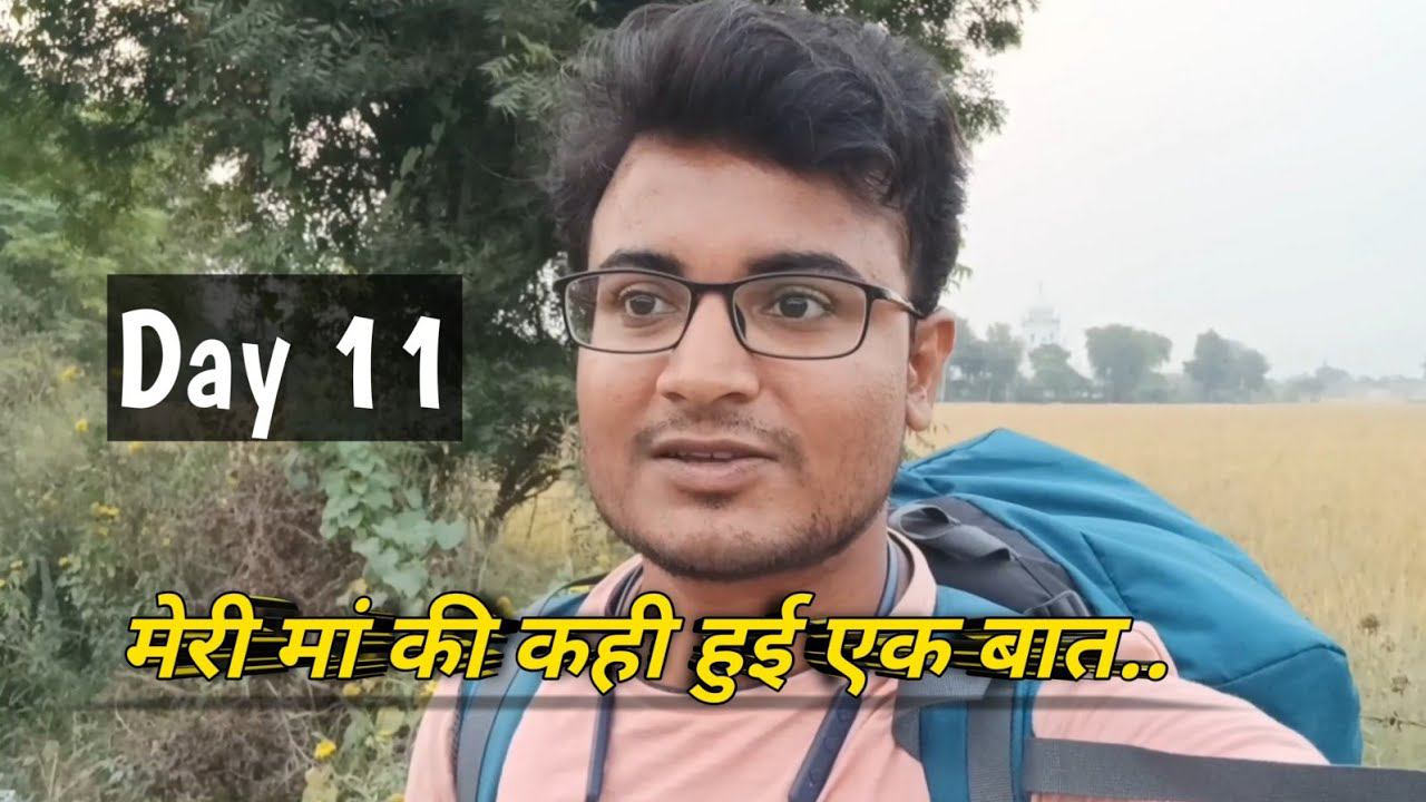 A traveler on a solo journey walking along a rural road in Punjab, surrounded by expansive fields under a clear blue sky, embodying the spirit of adventure and cultural exploration.