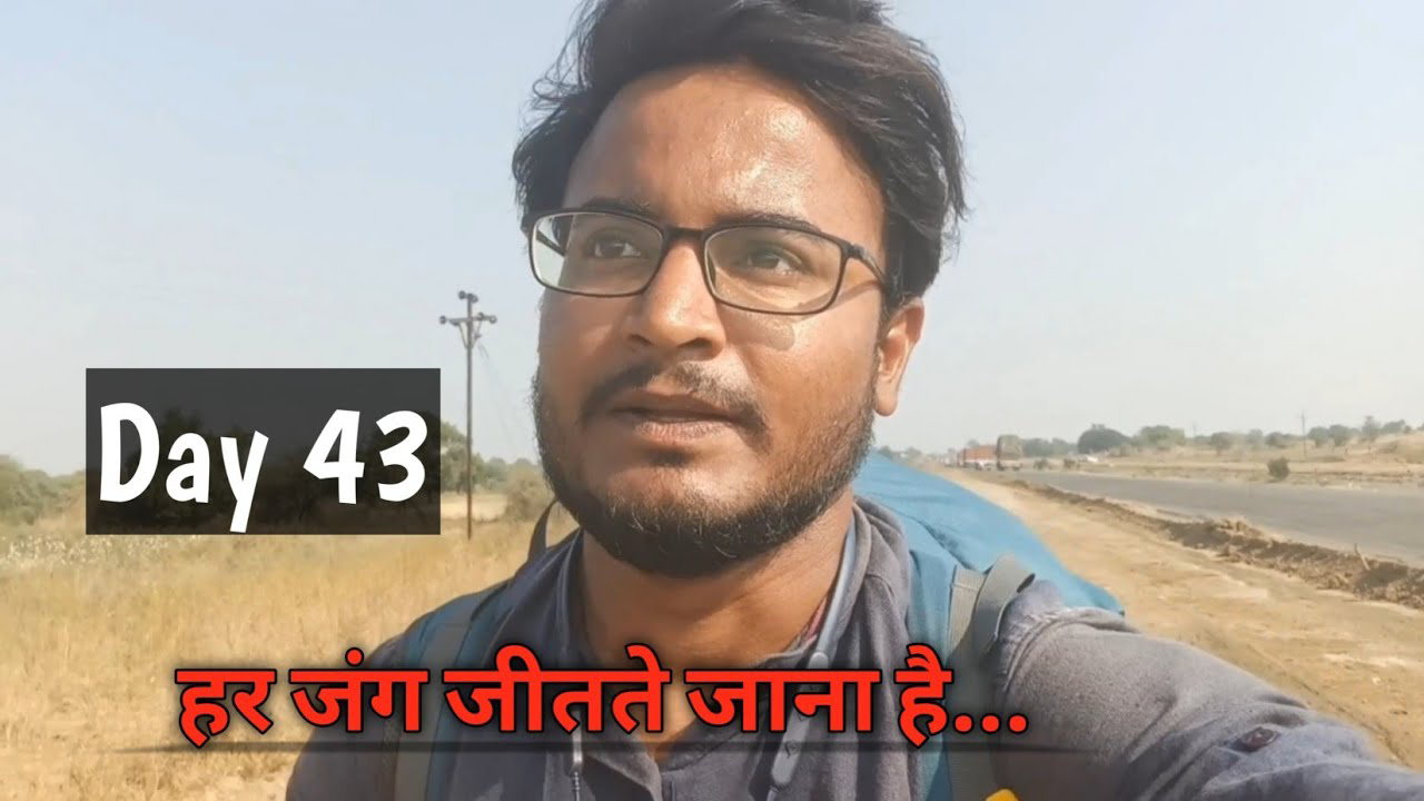 A serene rural landscape in Maharashtra, capturing a solitary figure walking along a dusty village road surrounded by lush greenery and traditional huts, embodying the essence of 'Deep Walks Deep Talks.'