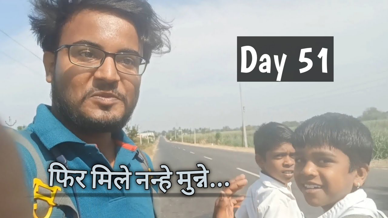 Pradeep Bhatt, equipped with his backpack, strolls from Dhoki to Tuljapur in Maharashtra, surrounded by the natural beauty and calm of the rural landscape.